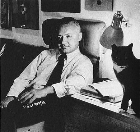 Portraits   |   At home with his cat                                      